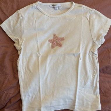 T-shirt bianco con stella marina