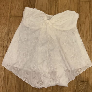 Top senza spalline in pizzo bianco