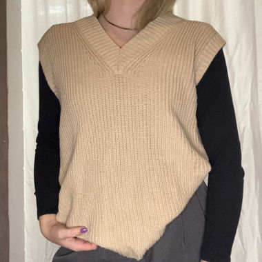 Beige knitted vest