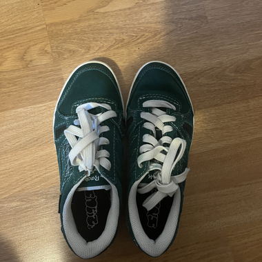 Green Reebok sneakers