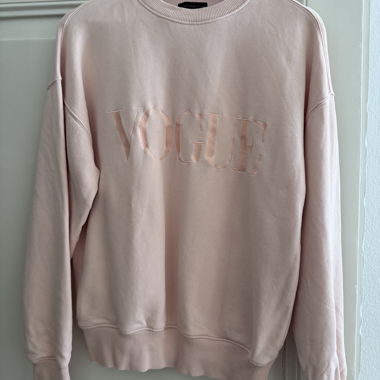 Felpa rosa della collezione Vogue