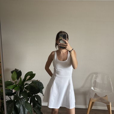 White sleeveless skater dress