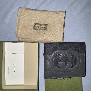 Portefeuille bifold en cuir Gucci