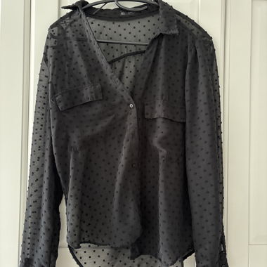 Camicia nera trasparente
