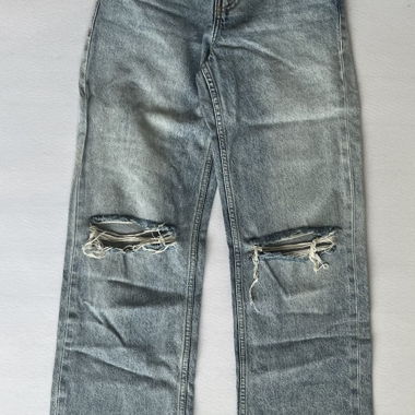 Jeans con buco