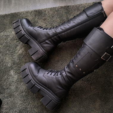 Black platform knee-high boots