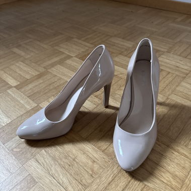 Beige patent pumps