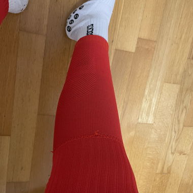 Rote Sportstulpen / Legwarmers