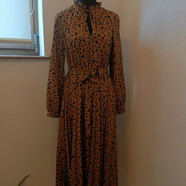 Abito leopard con fiocco