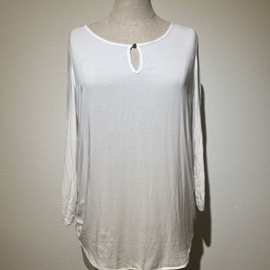 White long-sleeve shirt with gold buttons