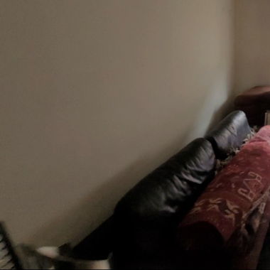 Schwarzes Ledersofa