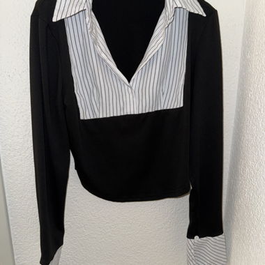 Blusa da donna nera a righe