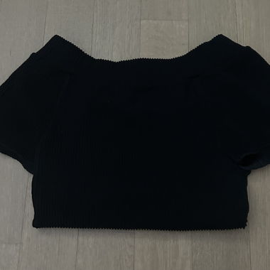 Pantaloncini in maglia neri a pieghe