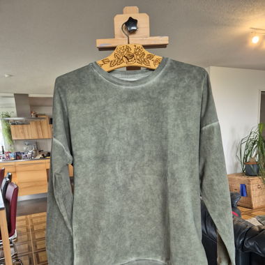 Grüner Pullover mit washed Look