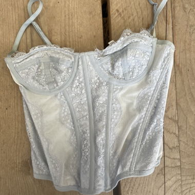 Corsetto in pizzo grigio chiaro