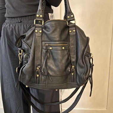 Black leather handbag with studs