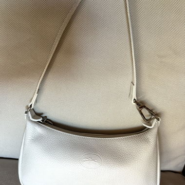 Longchamp white baguette bag.