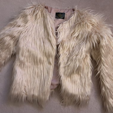 Veste en fourrure rose