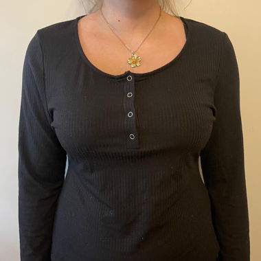 Black bodysuit with long sleeves