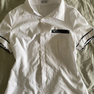 Blusa bianca a maniche corte