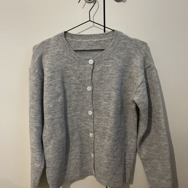 Grey knitted cardigan