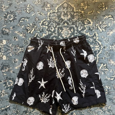 Costume da bagno nero con motivo marino