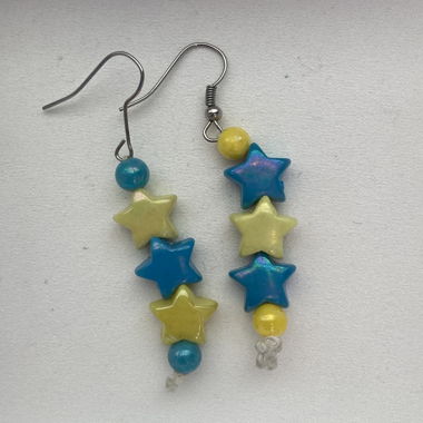 Orecchini a stella colorati con perle