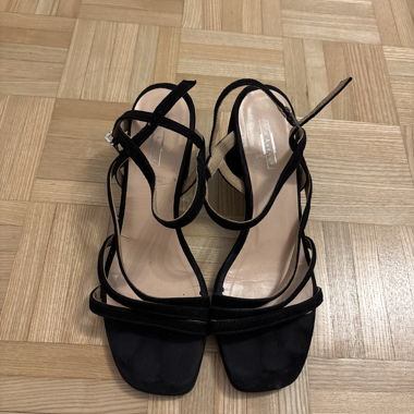 Black high heels with straps