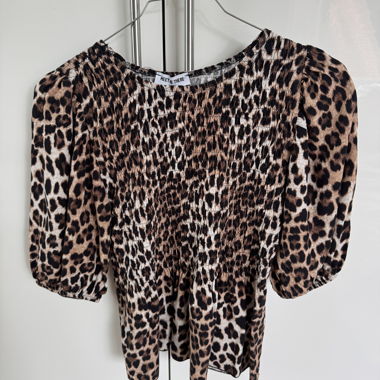 Smocked leo blouse 