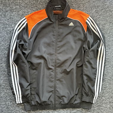 Adidas Climalite Jacke schwarz und orange Grösse L
