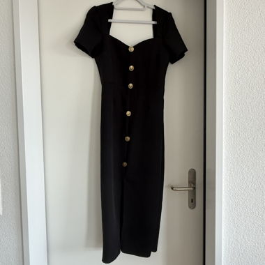 Black dress with gold buttons
