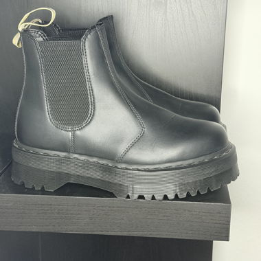 Black Dr. Martens boots with treaded sole