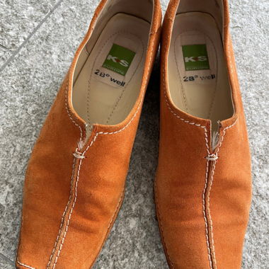 Orange leather slippers