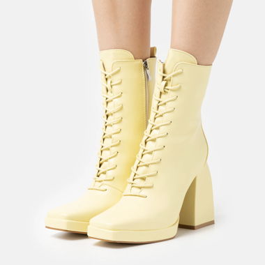 Yellow Lace Up Boots 