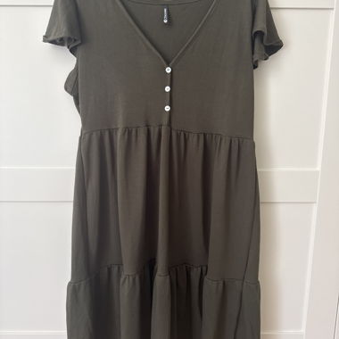 Dark women’s dress with button placket