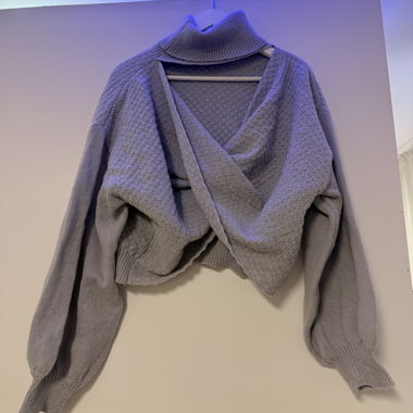 Backless roll-neck sweater