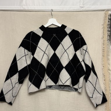 Pull à carreaux noir et blanc H&M 