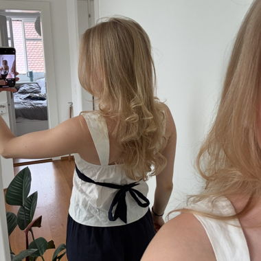 White & navy tie blouse 