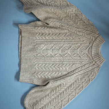 Maglione a trecce