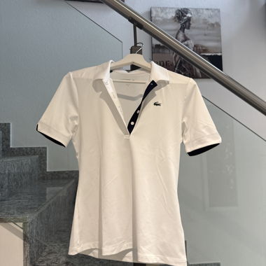 Polo bianca Lacoste da donna