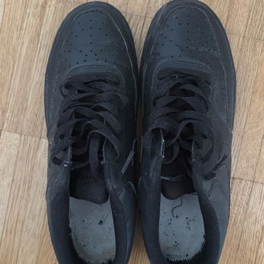 Black low-top Nike sneakers