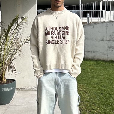 Cream and brown writing wool sweater