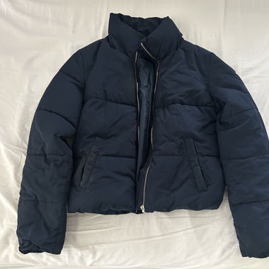 blue puffer jacket