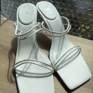white heeled sandals
