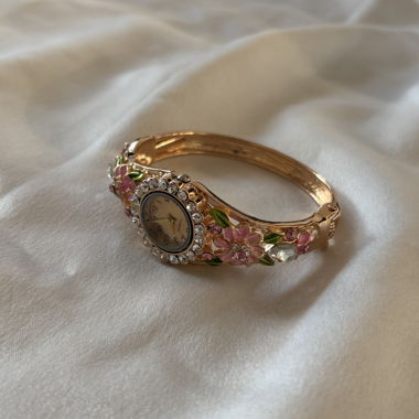 Montre-bracelet florale dorée