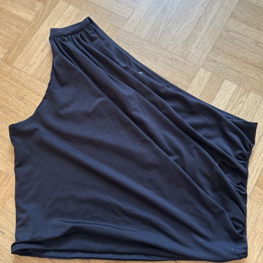 Top asimmetrico