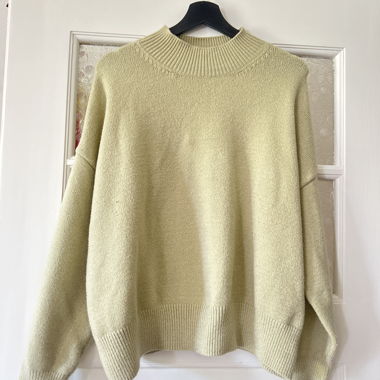Apple-green knit sweater (doesn’t show well in the photo)