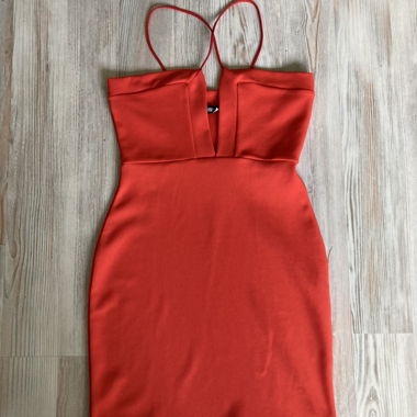 Red mini dress with straps and deep neckline