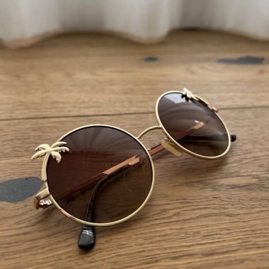 Runde Sonnenbrille mit Palmen