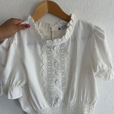 Blusa bianca in pizzo